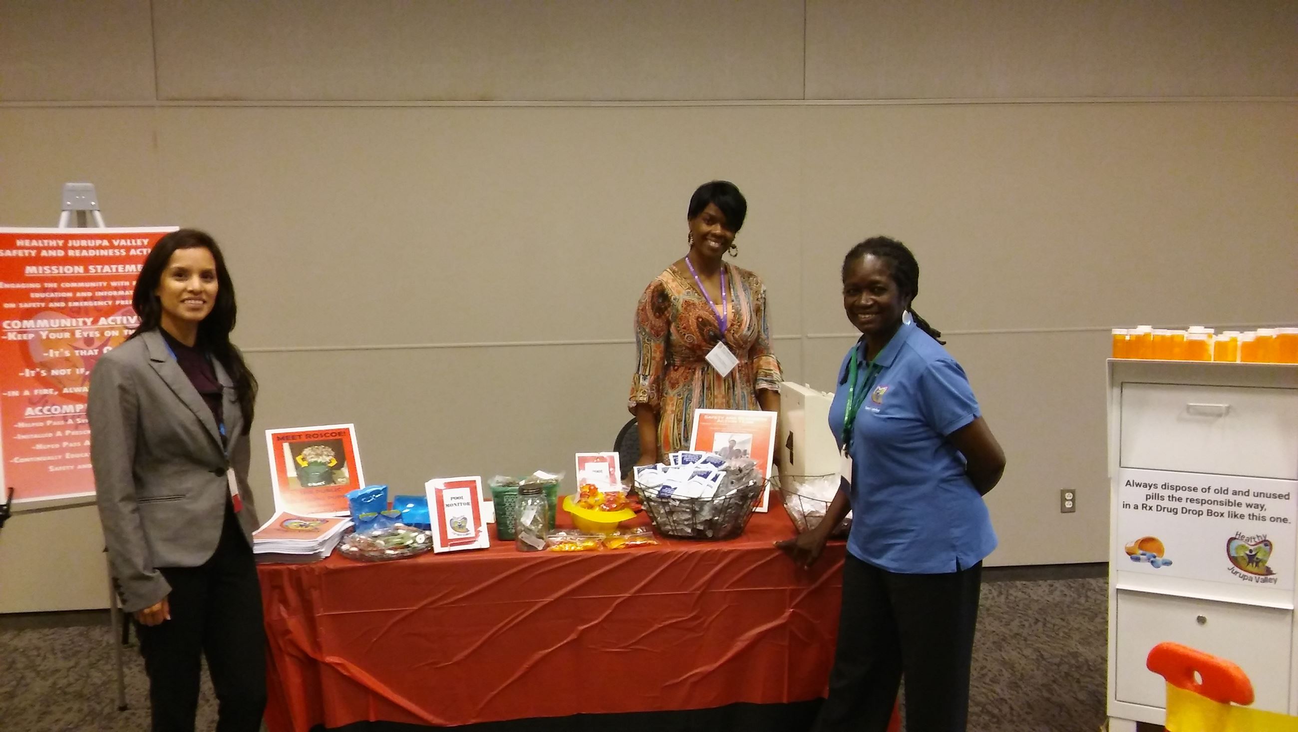 Safety and Readiness Action Team Members at Event Table
