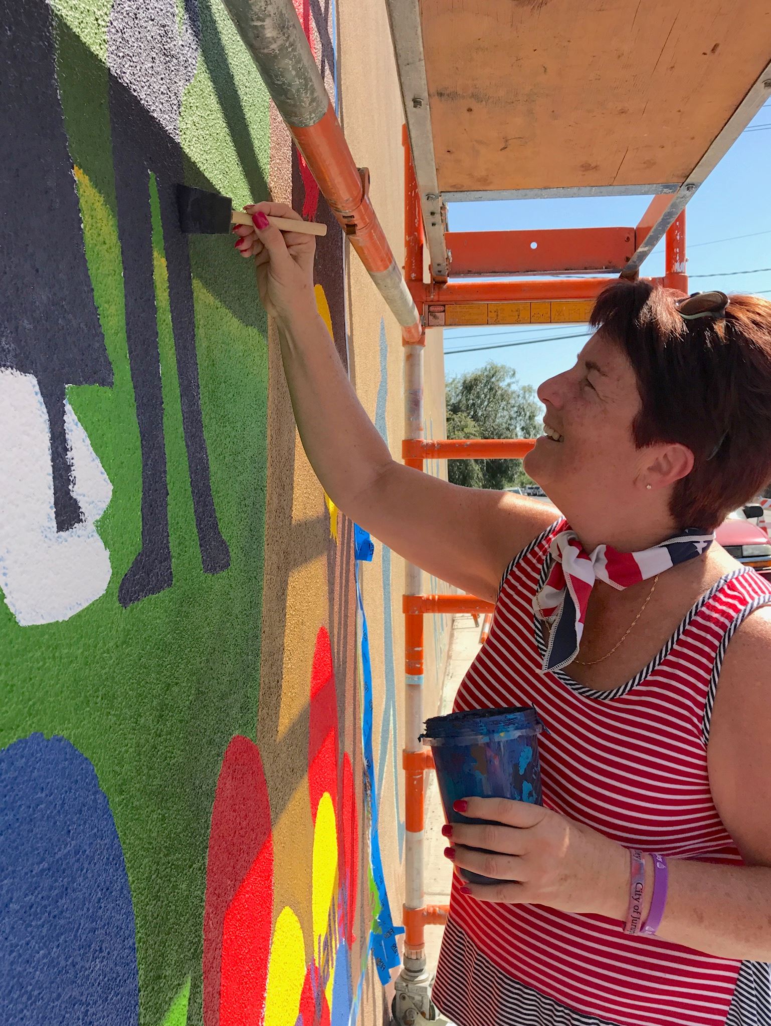 Woman Working on Mural