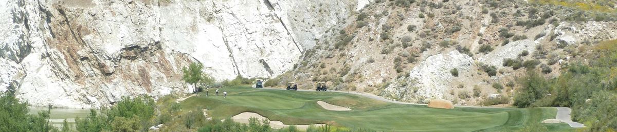 Golf Course by a Mountain